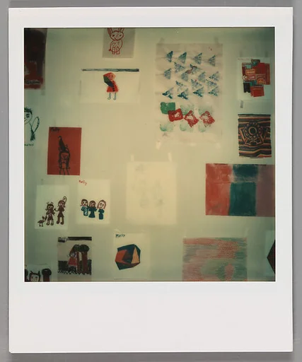 [Childrens' Drawings on Wall]