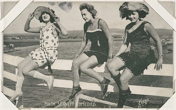 Bathing beauties seated on fence at beach from Mack Sennett Comedies Arcade series (W423) — Unknown