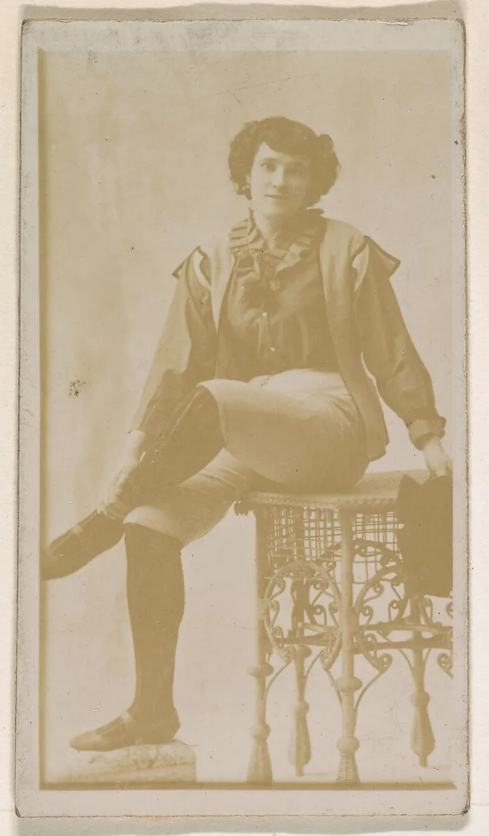 Actress seated on ornate stool, from the Actresses series (N245) issued by Kinney Brothers to promote Sweet Caporal Cigarettes — Kinney Brothers Tobacco Company