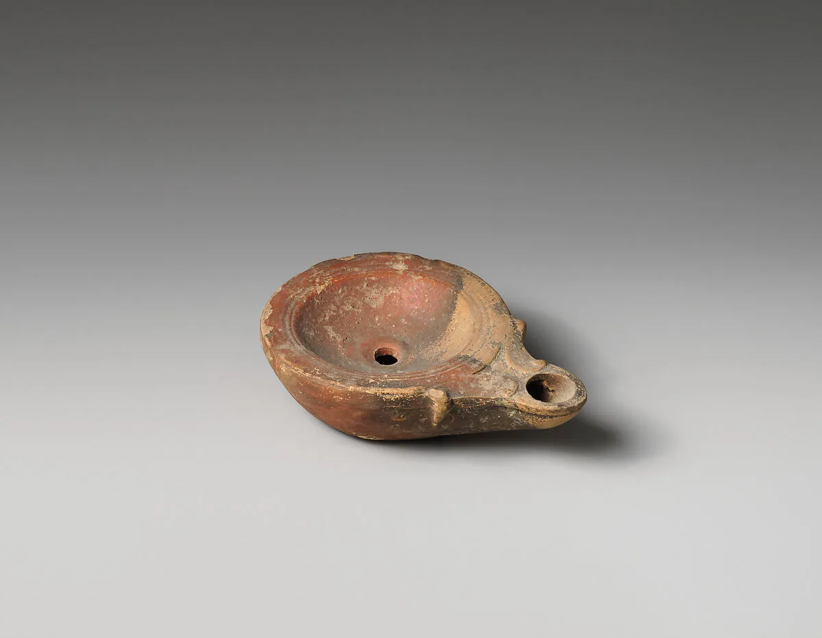 Terracotta oil lamp — Unknown