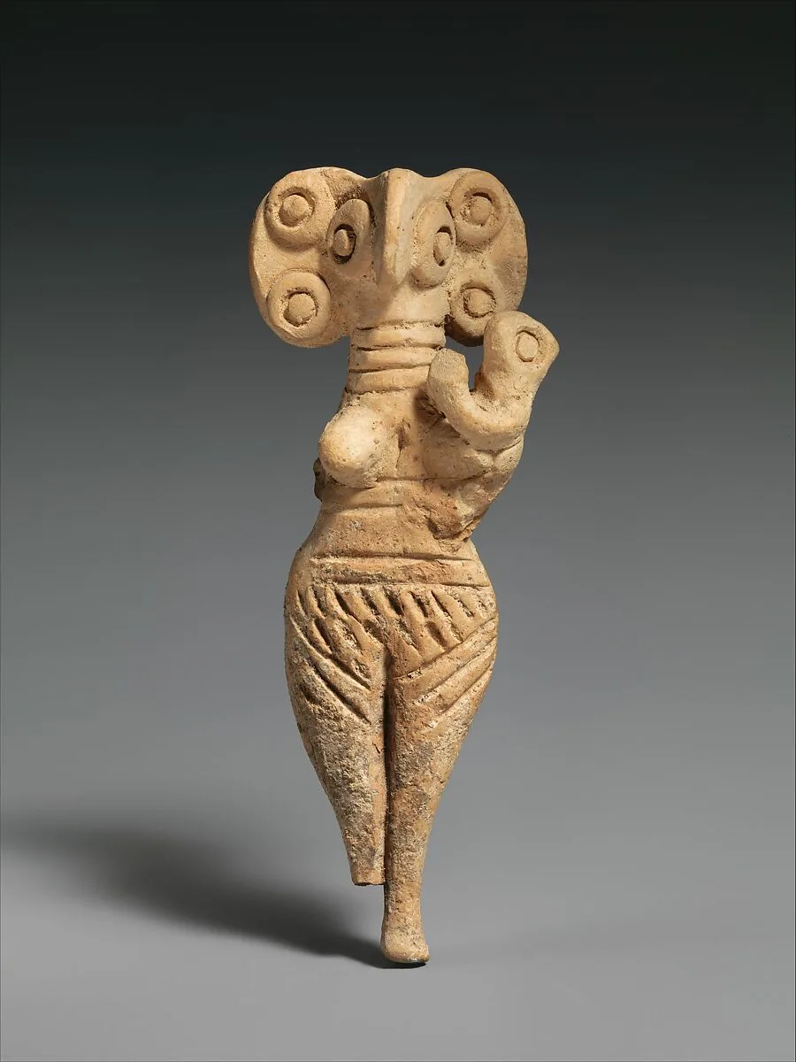 Terracotta statuette of woman with bird face — Unknown