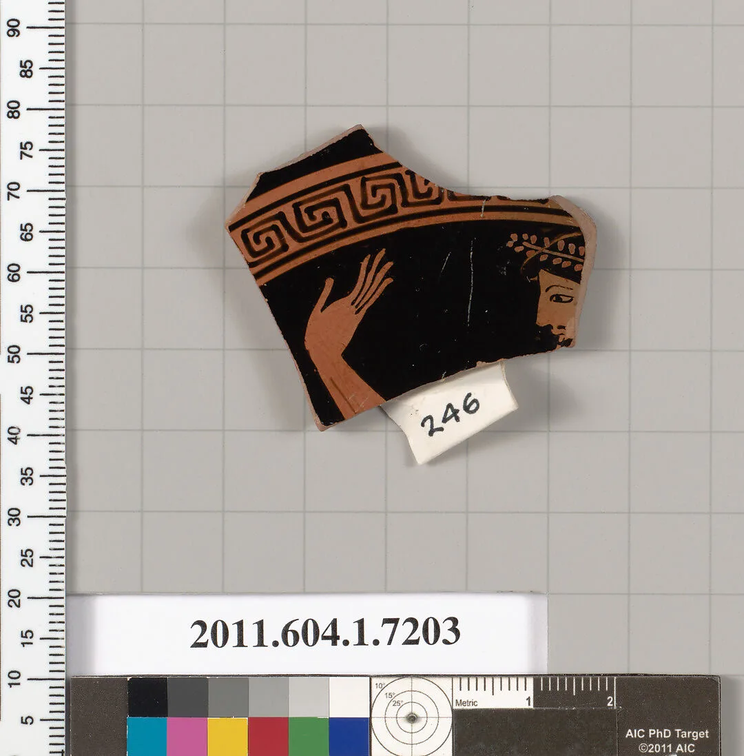 Terracotta fragment of a kylix (drinking cup) — Makron