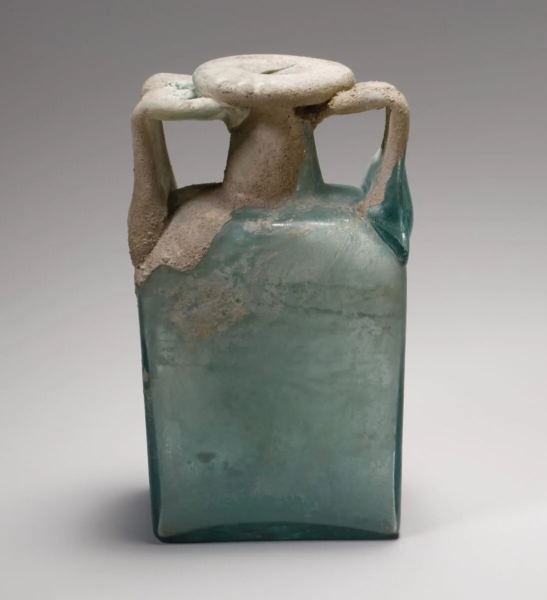 Glass rectangular bottle — Unknown