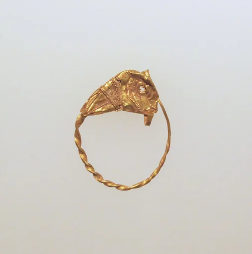 Gold earring with head of a bull