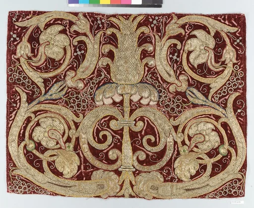 Golden tendrils against a red ground