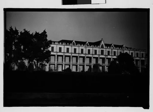 [Large Gothic Revival Building, From Moving Automobile, Convent Vicinity, Louisiana]