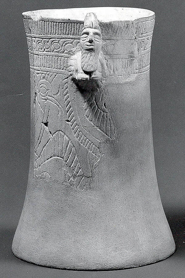 Vase with a handle in the form of a human-headed bull protome — Unknown