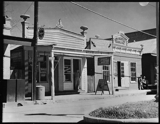 [Frank Polito Shoe Repair Shop and Aug. Reuter Hardware Store, Louisiana]