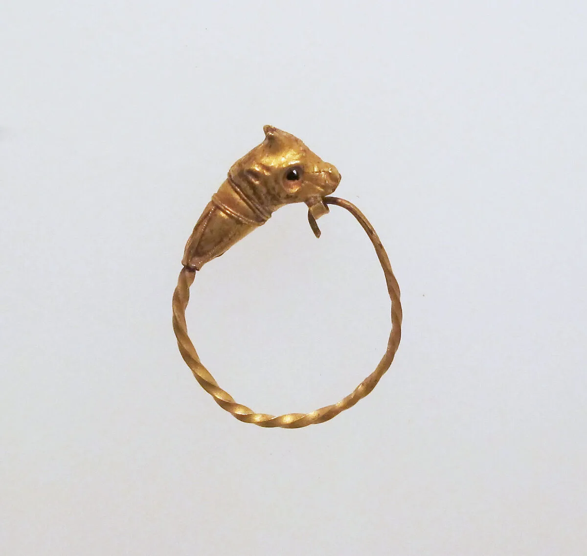 Gold earring with head of a bull — Unknown