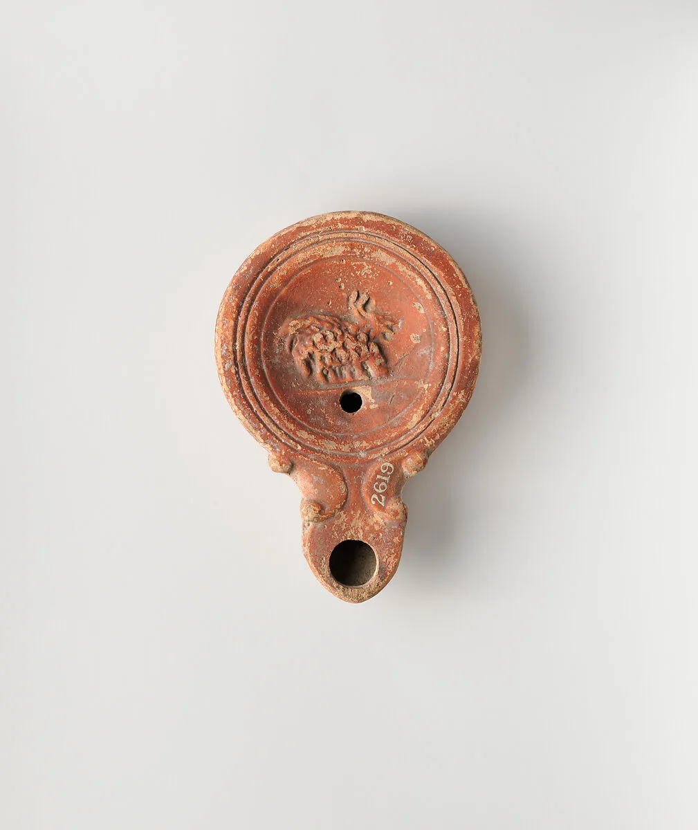Terracotta oil lamp — Unknown