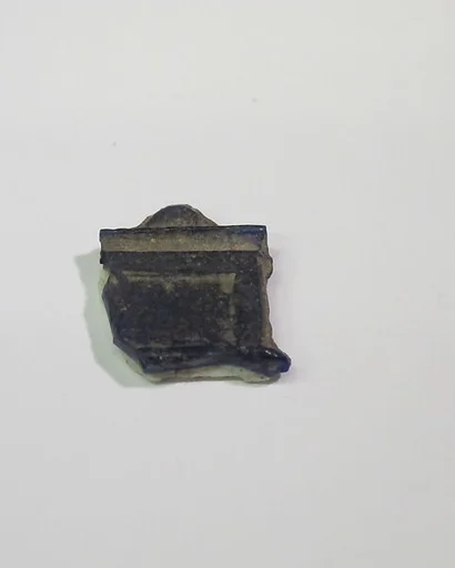 Mold-pressed amulet or fragment