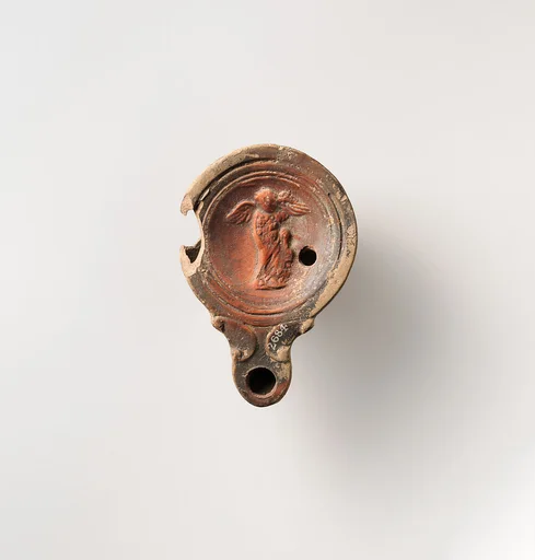 Terracotta oil lamp