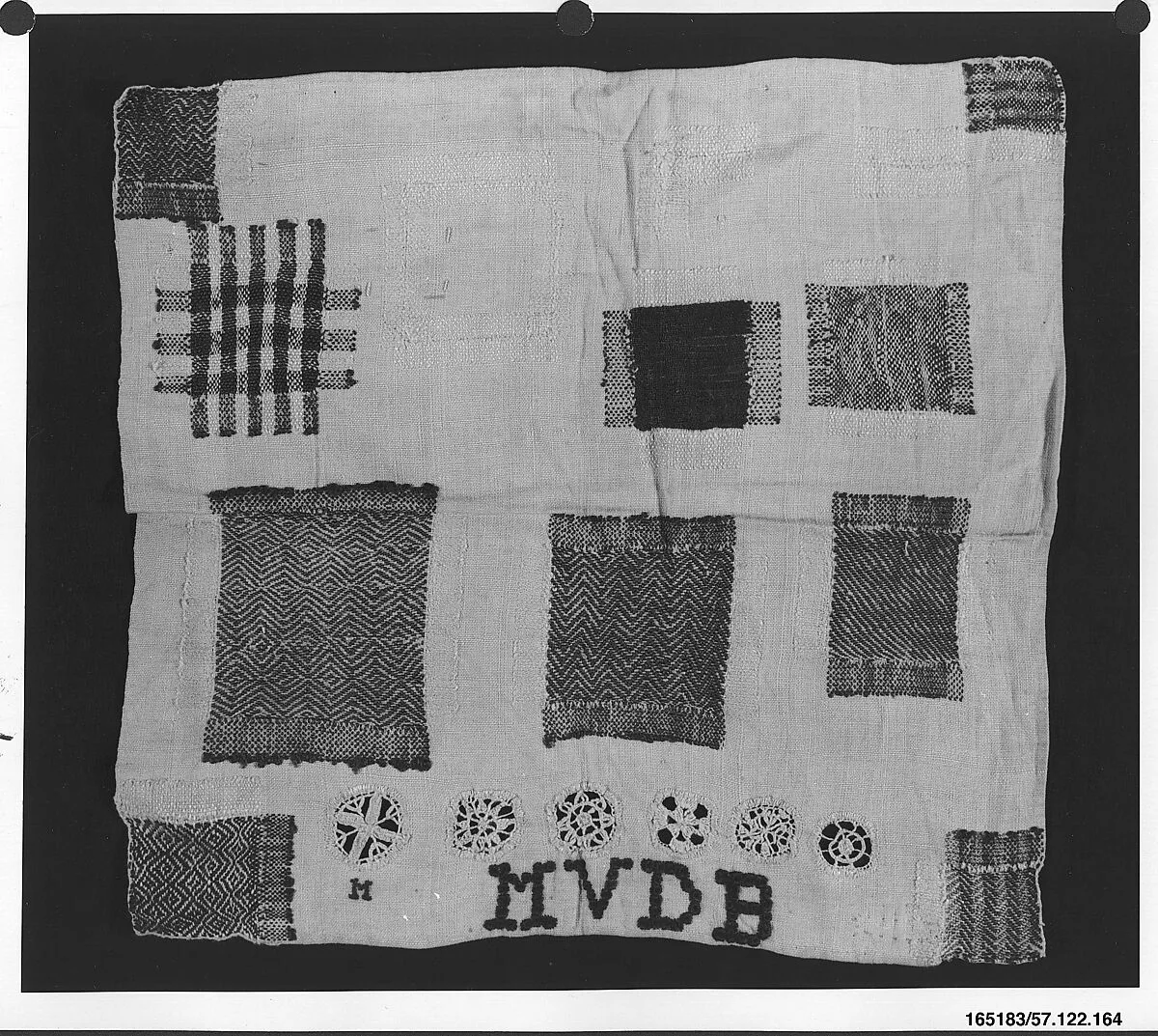 Embroidered darning sampler — Unknown