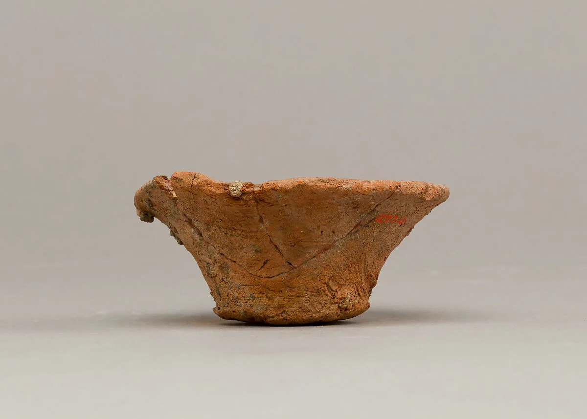 Bowl with stones and carnelian bead — Unknown