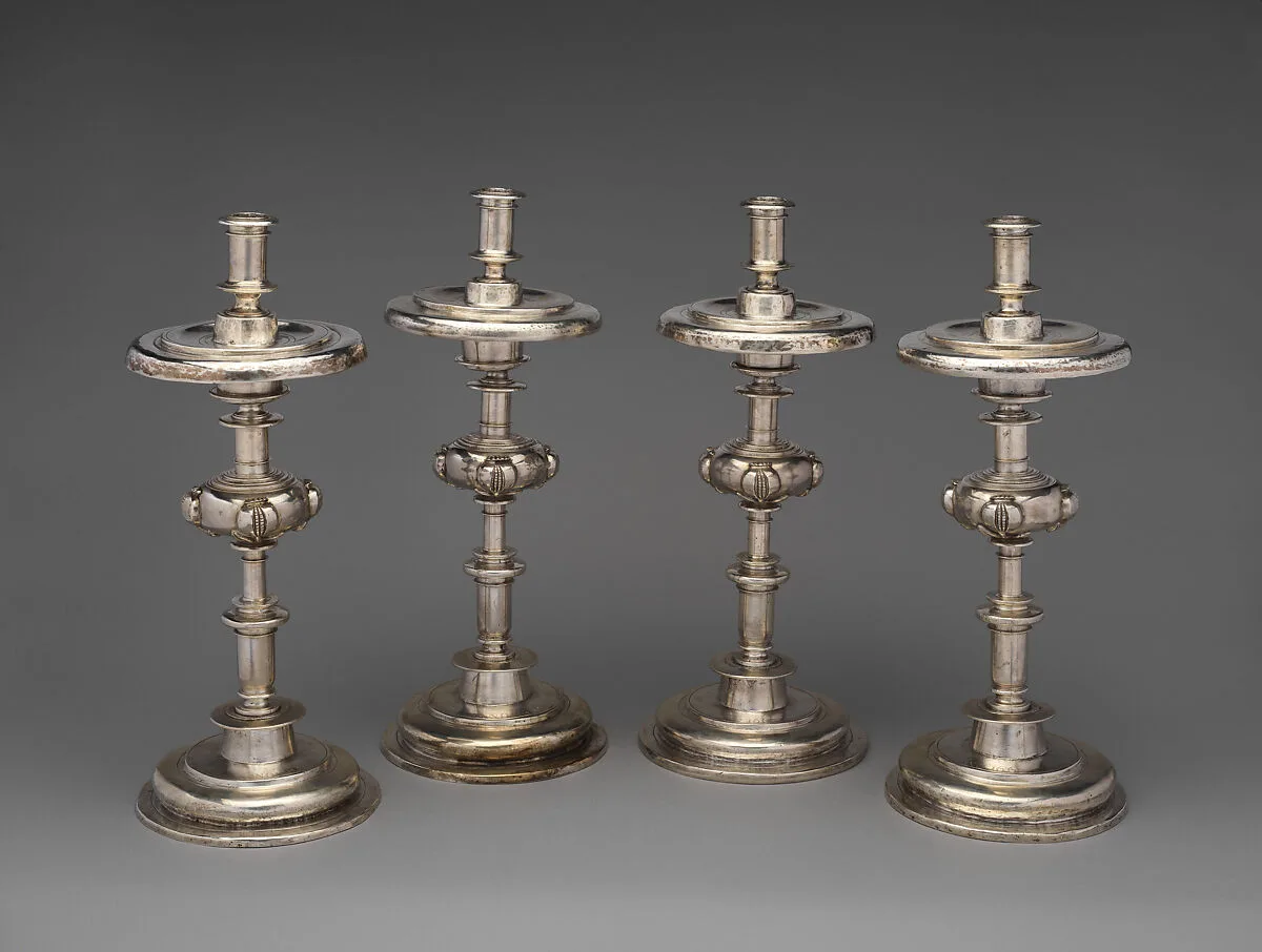 Set of four candlesticks — Unknown
