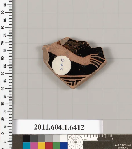 Terracotta fragment of a kylix (drinking cup)
