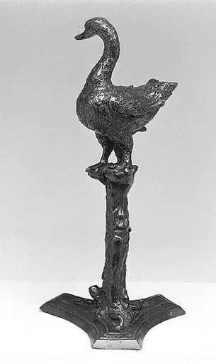 Renaissance-style inkwell wtih a swan standing on a tree stump