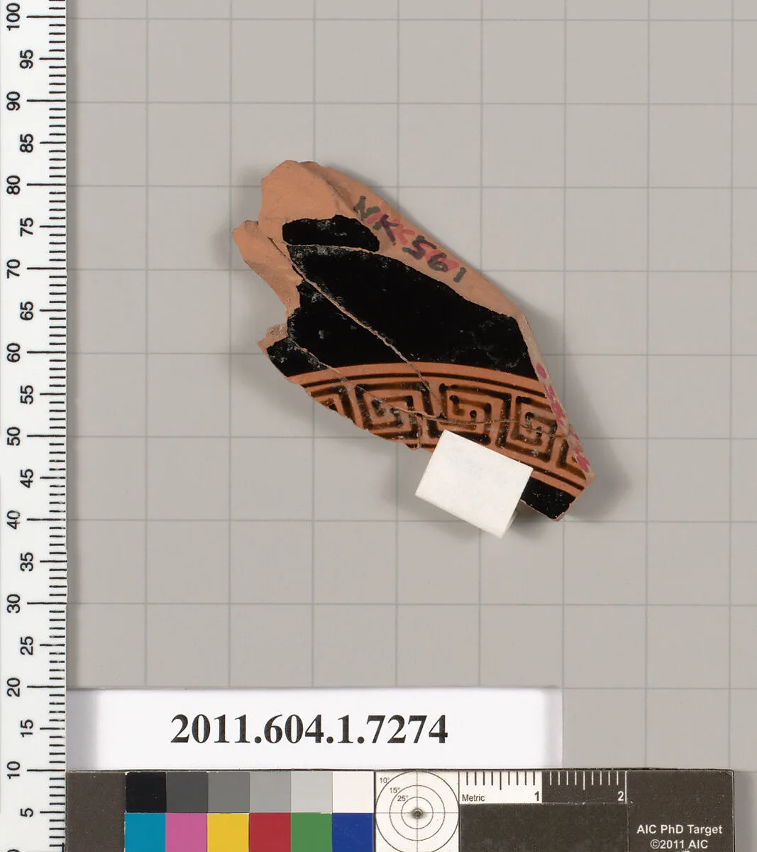 Terracotta fragment of a kylix (drinking cup) — Makron