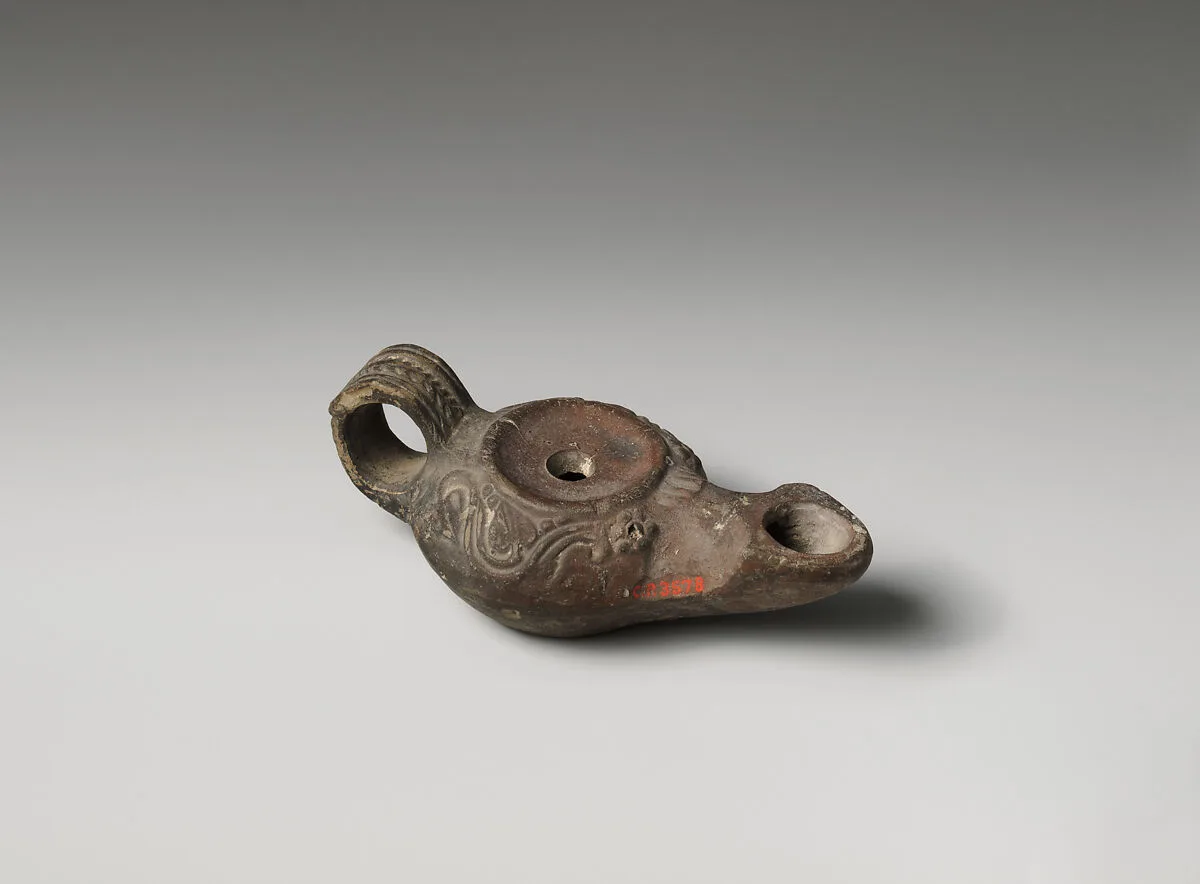 Terracotta oil lamp — Unknown