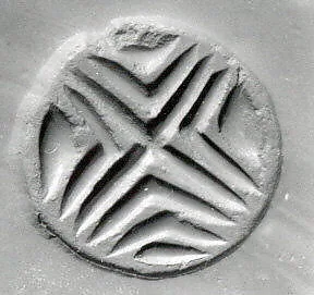 Conoid seal with pinched apex — Unknown