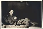 [John Trubee Seated on Bed with Cigarette, Villefranche, France]