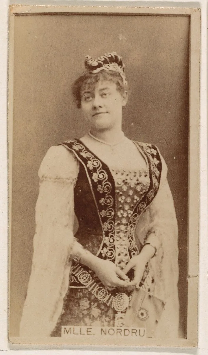 Mlle. Nordru, from the Actresses series (N245) issued by Kinney Brothers to promote Sweet Caporal Cigarettes — Kinney Brothers Tobacco Company