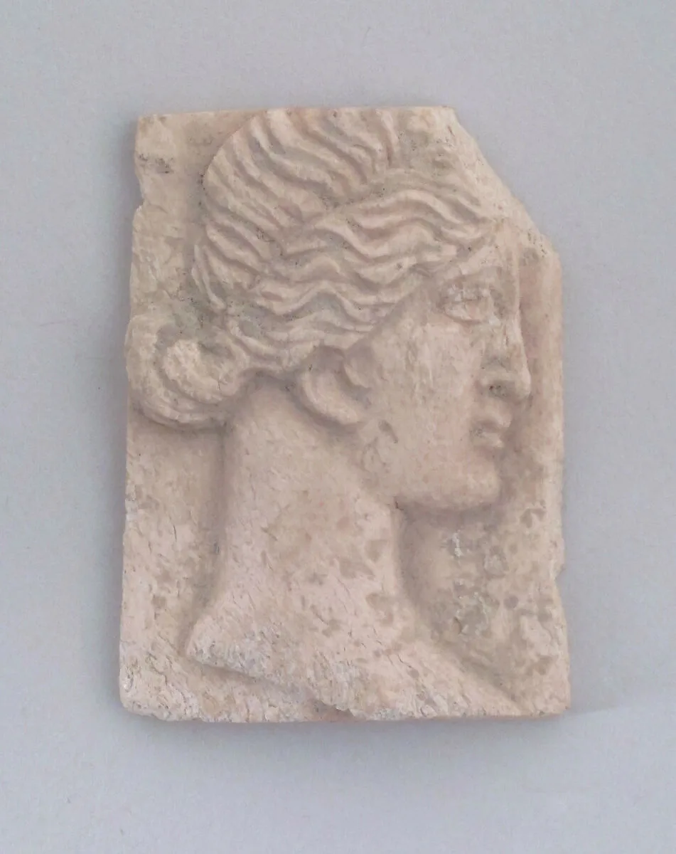 Relief of a head of woman — Unknown