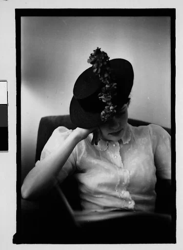 [Thirty-One 35mm Film Frames on Uncut Roll: Portraits of Anne Harvey Wearing Floral Hat]