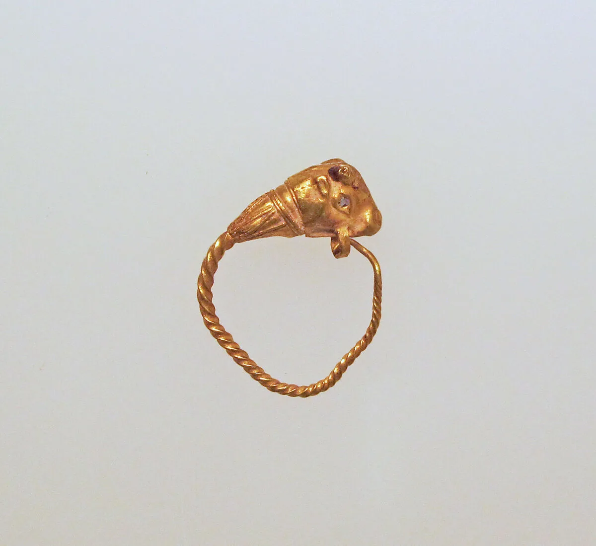 Gold earring with head of a bull — Unknown