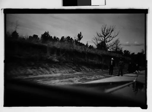 [People Walking by Side of Road, From Moving Automobile, Macon, Georgia]