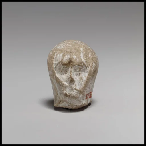 Terracotta head of a veiled woman