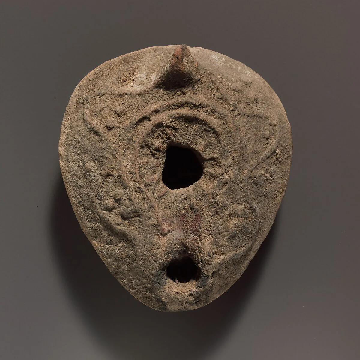 Terracotta oil lamp — Unknown