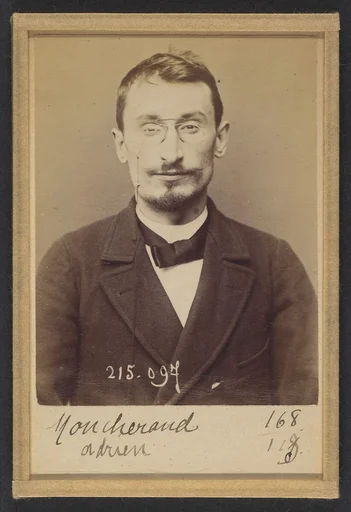 Moucheraud. Adrien, Eugène. 28 ans, né à Paris IVe. Imprimeur. Anarchiste. 4/3/94.
