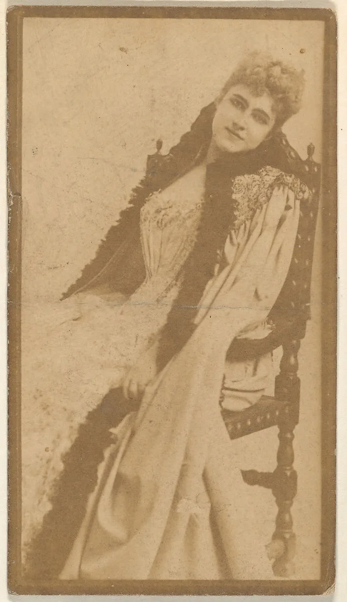 Actress seated in straight-backed chair, from the Actresses series (N668) — Unknown