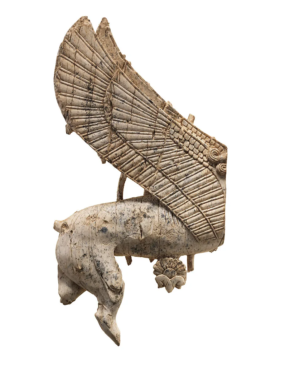 Openwork furniture plaque with sphinx striding through a floral landscape — Unknown