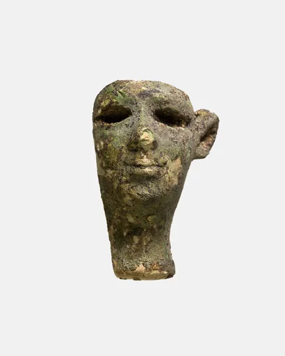 Male (originally red) head for composite statuette