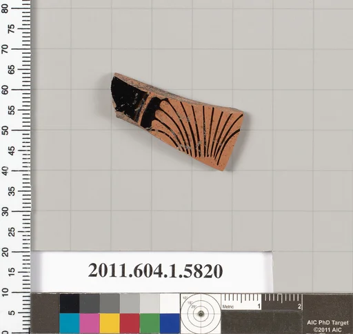 Terracotta fragment of a kylix: eye-cup (drinking cup)