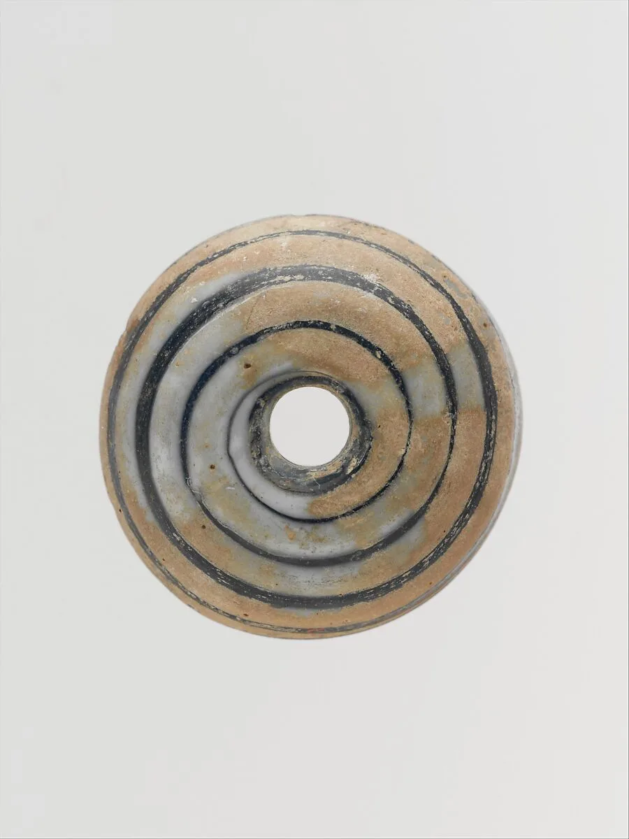 Glass spindle whorl — Unknown