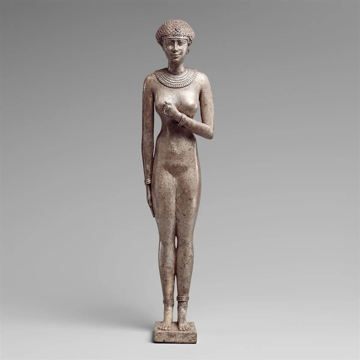 Statuette of a Royal (?) Woman with the Cartouches of Necho II on her Arms — Unknown