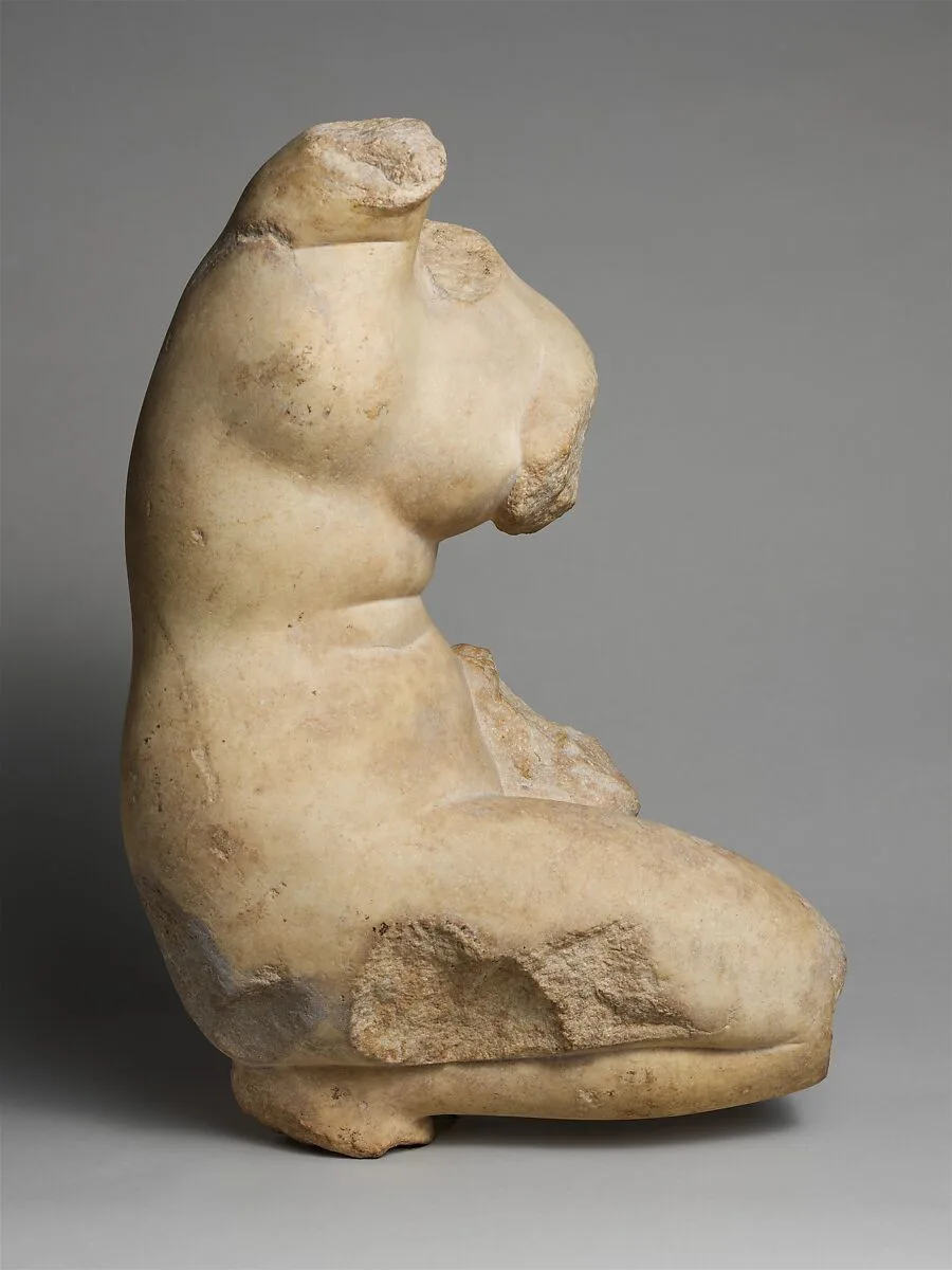 Marble statue of Aphrodite crouching and arranging her hair — Unknown