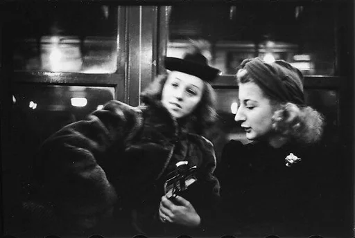[Five 35mm Film Frames: Subway Passengers, New York City: Two Women, Man in Cap, Woman in Hat and Fur Collar, Man in Hat]