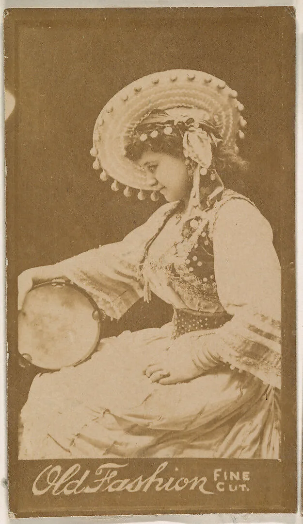 Actress posing with tambourine, from the Actresses series (N664) promoting Old Fashion Fine Cut Tobacco — Unknown