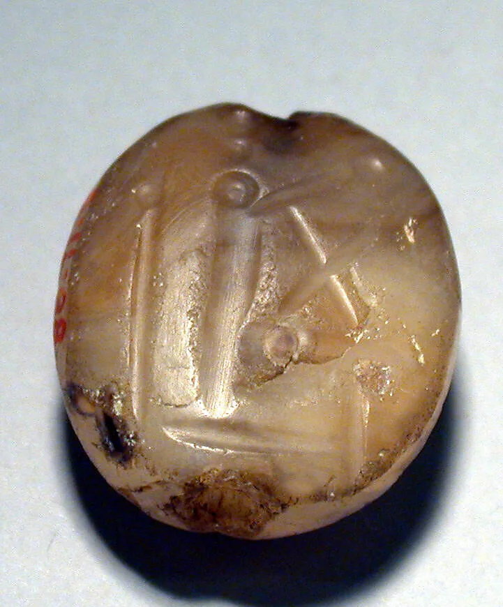 Stamp seal (scaraboid with pointed top) with deity (?) — Unknown