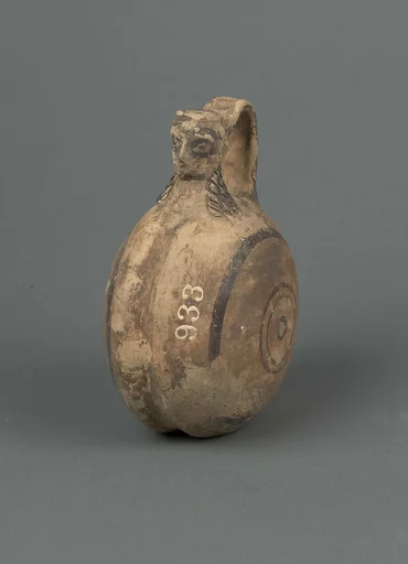 Jug with female head