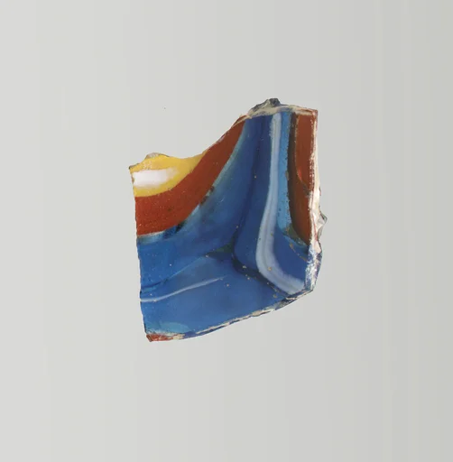 Glass mosaic ribbed bowl fragment