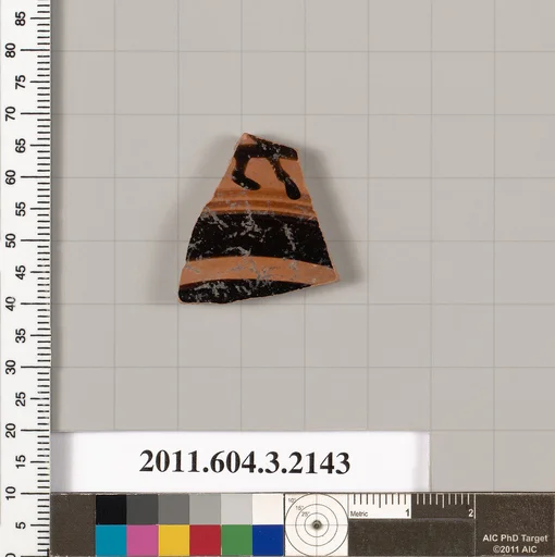 Terracotta fragment of a kylix (drinking cup)