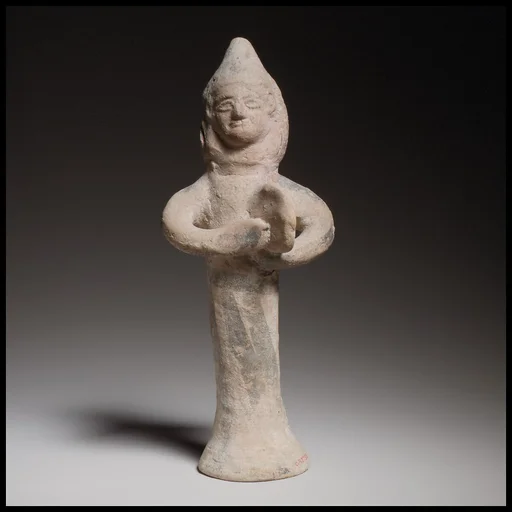 Terracotta statuette of a woman playing the tambourine