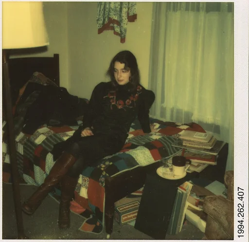 [Carla Steiger Seated on Her Bed, Oberlin, Ohio]