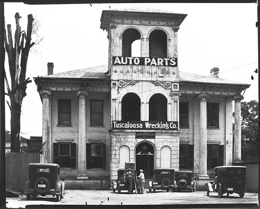 [Converted Italianate Revival House with Wrecking Company Signs on Tower and Workers and Parked Cars, Near Tuscaloosa, Alabama]