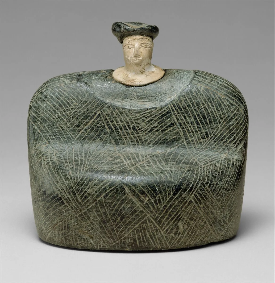 Seated female — Unknown